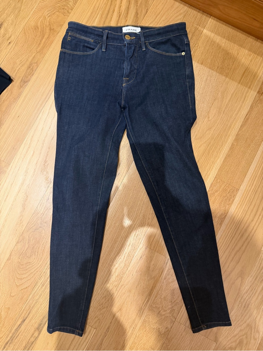 Frame Denim High-Rise Skinny Jeans in Dark Blue
